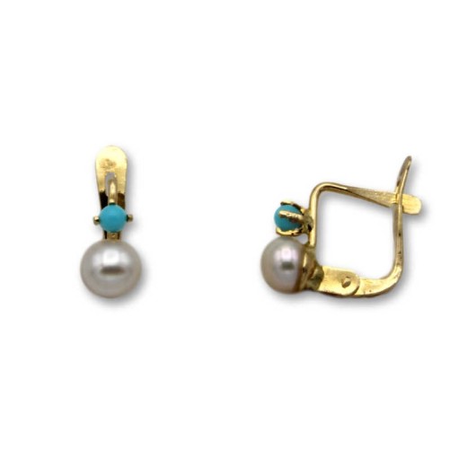 Pendiente de oro garra turquesa y perla 1ª postura