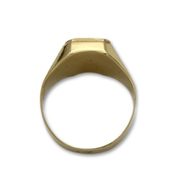 Sello de oro rectangular con tallas y rubí