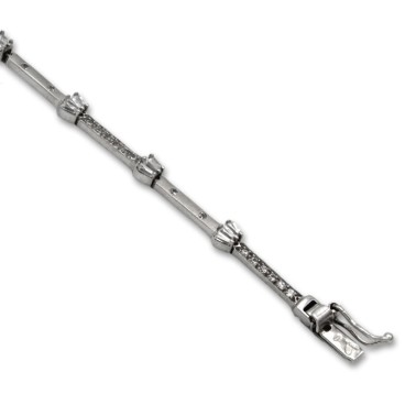 Pulsera de oro blanco con circonitas y tramos