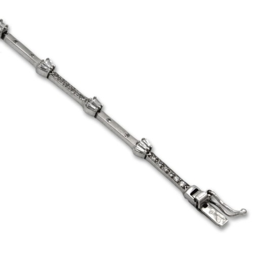 Pulsera de oro blanco con circonitas y tramos