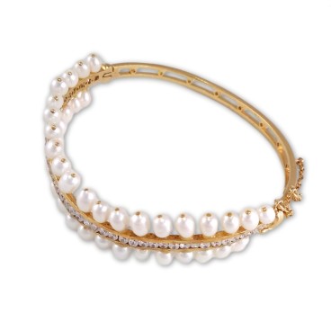 Pulsera de oro con perlas y circonitas