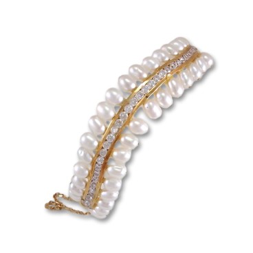 Conjunto de oro con circonitas y perlas