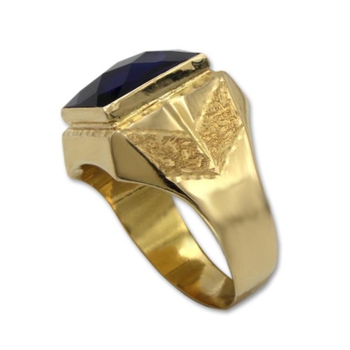 Sello de oro rectangular con tallas laterales y zafiro