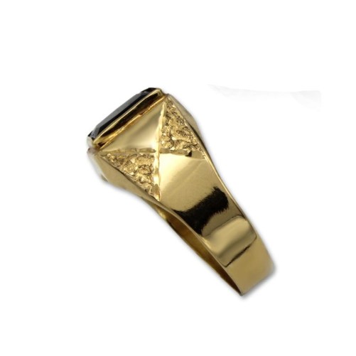 Sello de oro rectangular con tallas y zafiro