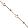 Pulsera de oro con corazones calados y bolas talladas