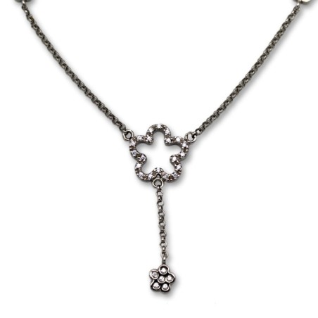 Conjunto de oro blanco con flores